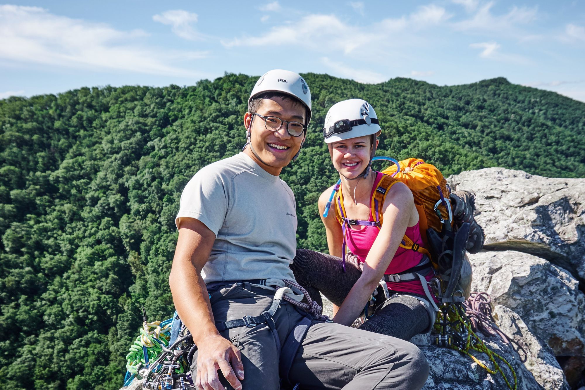 Rebecca and I at the top of a climb. You can see a sea of green trees below.